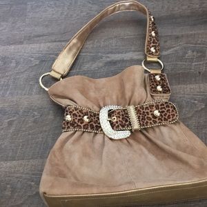 Kathy tan and leopard purse